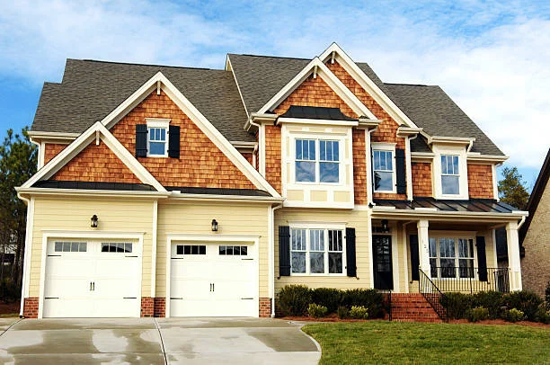 inspecting shingles during Georgia summer storm season
